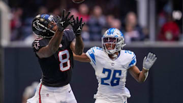 Dec 26, 2021; Atlanta, Georgia, USA; Atlanta Falcons tight end Kyle Pitts (8) catches a pass behind Detroit Lions cornerback Ifeatu Melifonwu (26) during the second half at Mercedes-Benz Stadium. Mandatory Credit: Dale Zanine-USA TODAY Sports