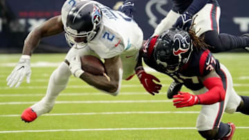 Jan 9, 2022; Houston, TX, USA; Tennessee Titans wide receiver Julio Jones (2) dives for a first down during the first quarter against the Houston Texans at NRG Stadium. Mandatory Credit: George Walker IV-USA TODAY Sports