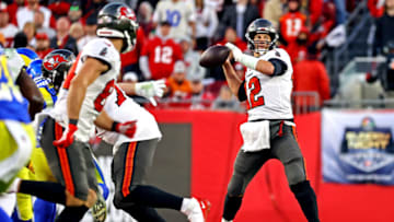 Jan 23, 2022; Tampa, Florida, USA; Tampa Bay Buccaneers quarterback Tom Brady (12) throws a pass during the second half against the Los Angeles Rams in a NFC Divisional playoff football game at Raymond James Stadium. Mandatory Credit: Kim Klement-USA TODAY Sports
