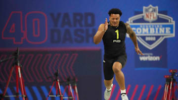 Mar 4, 2022; Indianapolis, IN, USA; Brigham Young running back Tyler Allgeier (RB01) runs the 40-yard dash during the 2022 NFL Scouting Combine at Lucas Oil Stadium. Mandatory Credit: Kirby Lee-USA TODAY Sports