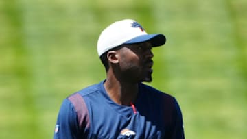 May 13, 2022; Englewood, CO, USA; Denver Broncos defensive coordinator Ejiro Evero during rookie mini camp drills at UCHealth Training Center. Mandatory Credit: Ron Chenoy-USA TODAY Sports