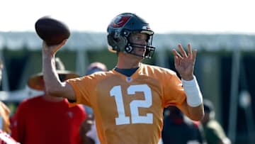 Jul 27, 2022; Tampa, FL, USA; Tampa Bay Buccaneers quarterback Tom Brady (12) throws the ball during training camp at Advent Health Training Complex. Mandatory Credit: Kim Klement-USA TODAY Sports