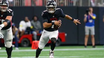 Sep 11, 2022; Atlanta, Georgia, USA; Atlanta Falcons quarterback Marcus Mariota (1) runs the ball against the New Orleans Saints in the second quarter at Mercedes-Benz Stadium. Mandatory Credit: Brett Davis-USA TODAY Sports