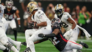 Sep 11, 2022; Atlanta, Georgia, USA; New Orleans Saints quarterback Jameis Winston (2) is hit by Atlanta Falcons safety Jaylinn Hawkins (32) during the second half at Mercedes-Benz Stadium. Mandatory Credit: Dale Zanine-USA TODAY Sports