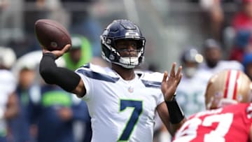 September 18, 2022; Santa Clara, California, USA; Seattle Seahawks quarterback Geno Smith (7) passes the football against San Francisco 49ers defensive end Nick Bosa (97) during the first quarter at Levi's Stadium. Mandatory Credit: Kyle Terada-USA TODAY Sports