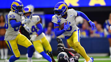 Sep 18, 2022; Inglewood, California, USA; Los Angeles Rams cornerback Jalen Ramsey (5) runs the ball after intercepting a pass intended for Atlanta Falcons wide receiver Bryan Edwards (89) during the second half at SoFi Stadium. Mandatory Credit: Gary A. Vasquez-USA TODAY Sports