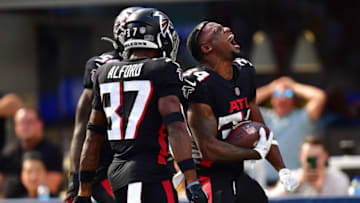 Sep 18, 2022; Inglewood, California, USA; Atlanta Falcons cornerback Darren Hall (34) celebrates after scoring a touchdown on a fumble recovery against the Los Angeles Rams during the second half at SoFi Stadium. Mandatory Credit: Gary A. Vasquez-USA TODAY Sports