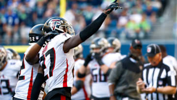 Sep 25, 2022; Seattle, Washington, USA; Atlanta Falcons safety Richie Grant (27) celebrates after intercepting a pass against the Seattle Seahawks during the fourth quarter at Lumen Field. Mandatory Credit: Joe Nicholson-USA TODAY Sports
