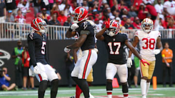 Oct 16, 2022; Atlanta, Georgia, USA; Atlanta Falcons tight end Kyle Pitts (8) celebrates after a touchdown catch with wide receiver Drake London (5) and wide receiver Olamide Zaccheaus (17) against the San Francisco 49ers in the second half at Mercedes-Benz Stadium. Mandatory Credit: Brett Davis-USA TODAY Sports