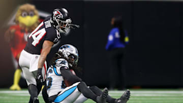 Oct 30, 2022; Atlanta, Georgia, USA; Carolina Panthers cornerback Donte Jackson (26) intercepts a pass in front of Atlanta Falcons wide receiver Damiere Byrd (14) in the first quarter at Mercedes-Benz Stadium. Mandatory Credit: Brett Davis-USA TODAY Sports