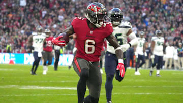 Nov 13, 2022; Munich, Germany; Tampa Bay Buccaneers wide receiver Julio Jones (6) scores a touchdown in the first half against the Seattle Seahawks during an NFL International Series game at Allianz Arena. Mandatory Credit: Kirby Lee-USA TODAY Sports
