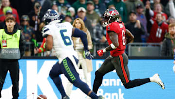 Nov 13, 2022; Munich, Germany, DEU; Tampa Bay Buccaneers wide receiver Julio Jones (6) runs the ball in for a touchdown against the Seattle Seahawks during the second quarter of an International Series game at Allianz Arena. Mandatory Credit: Douglas DeFelice-USA TODAY Sports