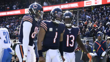 Nov 13, 2022; Chicago, Illinois, USA; Chicago Bears quarterback Justin Fields (1) celebrates with tight end Trevon Wesco (88) and wide receiver Byron Pringle (13) after he scores a touchdown against the Detroit Lions during the first half at Soldier Field. Mandatory Credit: Matt Marton-USA TODAY Sports