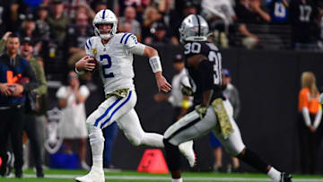 Nov 13, 2022; Paradise, Nevada, USA; Indianapolis Colts quarterback Matt Ryan (2) runs the ball against Las Vegas Raiders safety Duron Harmon (30) during the second half at Allegiant Stadium. Mandatory Credit: Gary A. Vasquez-USA TODAY Sports