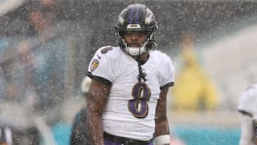 Nov 27, 2022; Jacksonville, Florida, USA; Baltimore Ravens quarterback Lamar Jackson (8) warms up before a game against the Jacksonville Jaguars at TIAA Bank Field. Mandatory Credit: Nathan Ray Seebeck-USA TODAY Sports