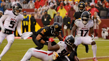Nov 27, 2022; Landover, Maryland, USA; Washington Commanders cornerback Kendall Fuller (29) intercepts a pass in the end zone intended for Atlanta Falcons running back Cordarrelle Patterson (84) in the final minute during the fourth quarter at FedExField. Mandatory Credit: Geoff Burke-USA TODAY Sports