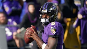 Dec 4, 2022; Baltimore, Maryland, USA; Baltimore Ravens quarterback Lamar Jackson (8) warms up prior to the game against the Denver Broncos at M&T Bank Stadium. Mandatory Credit: Mitch Stringer-USA TODAY Sports