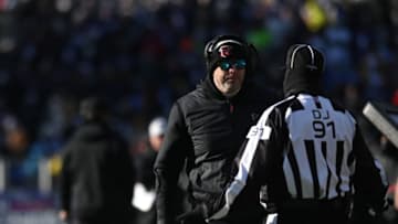 Dec 24, 2022; Baltimore, Maryland, USA; Atlanta Falcons head coach Arthur Smith speaks with down judge Jerry Bergman (91) during the game against the Baltimore Ravens at M&T Bank Stadium. Mandatory Credit: Tommy Gilligan-USA TODAY Sports