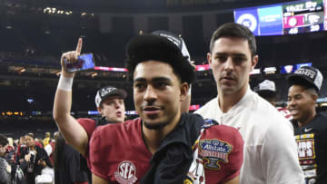 Dec 31, 2022; New Orleans, LA, USA; Alabama quarterback Bryce Young (9) walks away with the MVP trophy after throwing five touchdown passes during the 2022 Sugar Bowl at Caesars Superdome. Alabama defeated Kansas State 45-20. Mandatory Credit: Gary Cosby Jr.-USA TODAY Sports