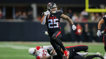 Jan 1, 2023; Atlanta, Georgia, USA; Atlanta Falcons running back Tyler Allgeier (25) runs the ball against the Arizona Cardinals in the first half at Mercedes-Benz Stadium. Mandatory Credit: Brett Davis-USA TODAY Sports