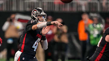 Jan 1, 2023; Atlanta, Georgia, USA; Atlanta Falcons quarterback Desmond Ridder (4) passes against the Arizona Cardinals during the second half at Mercedes-Benz Stadium. Mandatory Credit: Dale Zanine-USA TODAY Sports