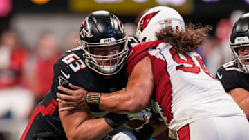 Jan 1, 2023; Atlanta, Georgia, USA; Atlanta Falcons guard Chris Lindstrom (63) blocks Arizona Cardinals defensive tackle Leki Fotu (95) during the second half at Mercedes-Benz Stadium. Mandatory Credit: Dale Zanine-USA TODAY Sports