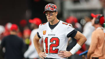 Jan 8, 2023; Atlanta, Georgia, USA; Tampa Bay Buccaneers quarterback Tom Brady (12) on the sideline against the Atlanta Falcons in the third quarter at Mercedes-Benz Stadium. Mandatory Credit: Brett Davis-USA TODAY Sports