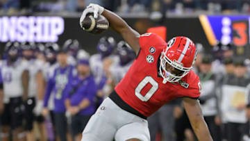 Jan 9, 2023; Inglewood, CA, USA; Georgia Bulldogs tight end Darnell Washington (0) runs the ball against TCU Horned Frogs safety Abraham Camara (14) during the second half in the CFP national championship game at SoFi Stadium. Mandatory Credit: Jayne Kamin-Oncea-USA TODAY Sports