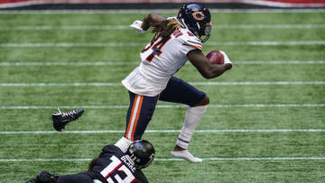 Sep 27, 2020; Atlanta, Georgia, USA; Chicago Bears wide receiver Cordarrelle Patterson (84) loses his shoe running against Atlanta Falcons wide receiver Christian Blake (13) on a punt return during the third quarter at Mercedes-Benz Stadium. Mandatory Credit: Dale Zanine-USA TODAY Sports