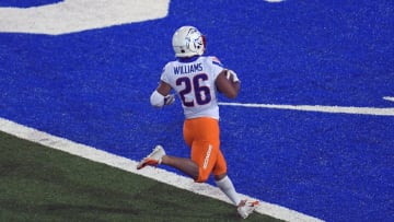 Oct 31, 2020; Colorado Springs, Colorado, USA; Boise State Broncos cornerback Avery Williams (26) scores an eighty eight yard kickoff return in the second half against the Air Force Falcons at Falcon Stadium. Mandatory Credit: Ron Chenoy-USA TODAY Sports