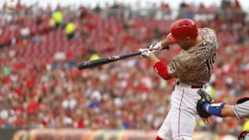 Aug 19, 2016; Cincinnati, OH, USA; Cincinnati Reds first baseman Joey Votto hits a three-run home run against the Los Angeles Dodgers during the first inning at Great American Ball Park. Mandatory Credit: David Kohl-USA TODAY Sports