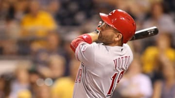 Sep 10, 2016; Pittsburgh, PA, USA; Cincinnati Reds first baseman Joey Votto (19) hits a solo home run against the Pittsburgh Pirates during the ninth inning at PNC Park. The Reds won 8-7. Mandatory Credit: Charles LeClaire-USA TODAY Sports