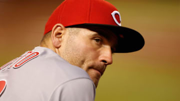 PHOENIX, ARIZONA - APRIL 09: Joey Votto #19 of the Cincinnati Reds watches from the dugout. (Photo by Christian Petersen/Getty Images)