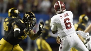 Dec 6, 2014; Atlanta, GA, USA; Missouri Tigers defensive lineman Shane Ray (56) tackles Alabama Crimson Tide quarterback Blake Sims (6) during the second quarter of the 2014 SEC Championship Game at the Georgia Dome. The play caused Ray to be ejected from the game for targeting. Mandatory Credit: Dale Zanine-USA TODAY Sports