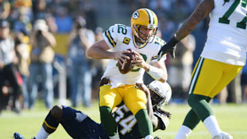 CARSON, CALIFORNIA - NOVEMBER 03: Melvin Ingram III #54 of the Los Angeles Chargers sacks Aaron Rodgers #12 of the Green Bay Packers during the second quarter at Dignity Health Sports Park on November 03, 2019 in Carson, California. (Photo by Harry How/Getty Images)