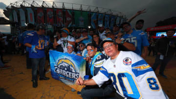 MEXICO CITY, MEXICO - NOVEMBER 18: Fans of the Los Angeles Chargers pose for photos before the game against the Kansas City Chiefs at Estadio Azteca on November 18, 2019 in Mexico City, Mexico. (Photo by Manuel Velasquez/Getty Images)