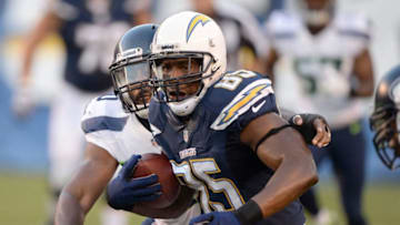 SAN DIEGO, CA - AUGUST 08: Antonio Gates #85 of the San Diego Chargers makes a catch as he is tackled from behind by K.J. Wright #50 of the Seattle Seahawks at Qualcomm Stadium on August 8, 2013 in San Diego, California. (Photo by Harry How/Getty Images)