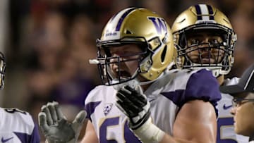 SALT LAKE CITY, UT - SEPTEMBER 15: Kaleb McGary #58 of the Washington Huskies celebrates a touchdown awarded after a review in the second half of a game against the Utah Utes at Rice-Eccles Stadium on September 15, 2018 in Salt Lake City, Utah. The Washington Huskies beat the Utah Utes 21-7. (Photo by Gene Sweeney Jr/Getty Images)