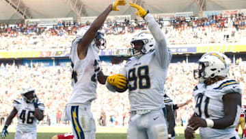 CARSON, CA - SEPTEMBER 30: Isaac Rochell #98 of the Los Angeles Chargers celebrate with teammate Trevor Williams #24 after intercepting quarterback C.J. Beathard #3 of the San Francisco 49ers throw in the closing minutes of the game at StubHub Center on September 30, 2018 in Carson, California. (Photo by Kevork Djansezian/Getty Images)