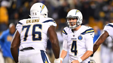 PITTSBURGH, PA - DECEMBER 02: Mike Badgley #4 of the Los Angeles Chargers celebrates with Russell Okung #76 after kicking the game winning field goal to give the Chargers a 33-30 win over the Pittsburgh Steelers at Heinz Field on December 2, 2018 in Pittsburgh, Pennsylvania. (Photo by Joe Sargent/Getty Images)