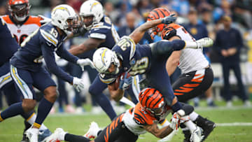 CARSON, CA - DECEMBER 09: Free safety Jessie Bates #30 of the Cincinnati Bengals stops running back Austin Ekeler #30 of the Los Angeles Chargers in the third quarter at StubHub Center on December 9, 2018 in Carson, California. (Photo by Sean M. Haffey/Getty Images)