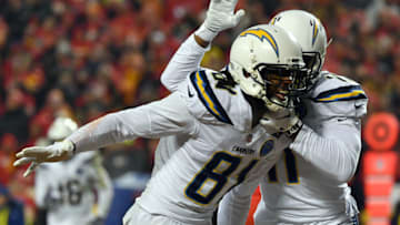 KANSAS CITY, MISSOURI - DECEMBER 13: Wide receiver Mike Williams #81 and wide receiver Geremy Davis #11 of the Los Angeles Chargers celebrate after a touchdown during the game against the Kansas City Chiefs at Arrowhead Stadium on December 13, 2018 in Kansas City, Missouri. (Photo by Peter Aiken/Getty Images)