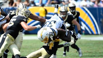 CARSON, CA - AUGUST 18: Troymaine Pope #35 of the Los Angeles Chargers is stopped by Chauncey Gardner-Johnson #22 of the New Orleans Saints during the second half of their pre season football game at Dignity Health Sports Park on August 18, 2019 in Carson, California. (Photo by Kevork Djansezian/Getty Images)