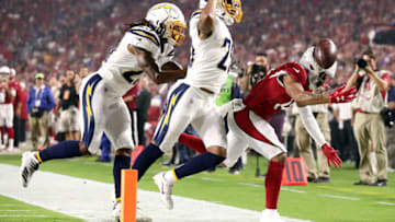 GLENDALE, ARIZONA - AUGUST 08: Jeff Richards #29 of the Los Angeles Chargers breaks up a pass intended for Damiere Byrd #14 of the Arizona Cardinals during a preseason game at State Farm Stadium on August 08, 2019 in Glendale, Arizona. (Photo by Christian Petersen/Getty Images)