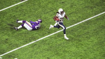 MINNEAPOLIS, MN - AUGUST 28: Melvin Gordon #28 of the San Diego Chargers avoids the tackle of Terence Newman #23 of the Minnesota Vikings for a touchdown in the second quarter at U.S. Bank Stadium on August 28, 2016 in Minneapolis, Minnesota. (Photo by Adam Bettcher/Getty Images)