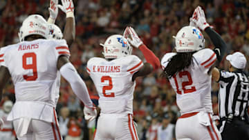TUCSON, AZ - SEPTEMBER 09: Safety Khalil Williams #2 and linebacker D'Juan Hines #12 of the Houston Cougars signal a safety during the second half of the game against the Arizona Wildcats at Arizona Stadium on September 9, 2017 in Tucson, Arizona. The Houston Cougars won 19-16. (Photo by Jennifer Stewart/Getty Images)