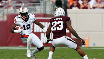 COLLEGE STATION, TX - NOVEMBER 04: Eli Stove #12 of the Auburn Tigers looks to get around Armani Watts #23 of the Texas A&M Aggies at Kyle Field on November 4, 2017 in College Station, Texas. (Photo by Bob Levey/Getty Images)
