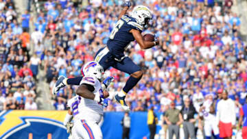 CARSON, CA - NOVEMBER 19: Tyrell Williams #16 of the Los Angeles Chargers leaps over Micah Hyde #23 of the Buffalo Bills during the game at the StubHub Center on November 19, 2017 in Carson, California. (Photo by Harry How/Getty Images)