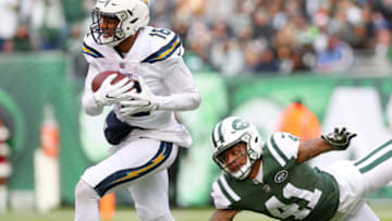 EAST RUTHERFORD, NJ - DECEMBER 24: Tyrell Williams #16 of the Los Angeles Chargers carries the ball past Buster Skrine #41 of the New York Jets during the first half in an NFL game at MetLife Stadium on December 24, 2017 in East Rutherford, New Jersey. (Photo by Ed Mulholland/Getty Images)