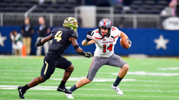 LUBBOCK, TX - NOVEMBER 11: Dylan Cantrell #14 of the Texas Tech Red Raiders tries to get by Grayland Arnold #4 of the Baylor Bears during the first half of the game between the Baylor Bears and the Texas Tech Red Raiders on November 11, 2017 at AT&T Stadium in Arlington, Texas. (Photo by John Weast/Getty Images)